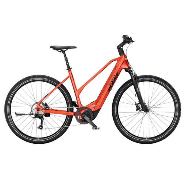 Bicicleta elétrica de trekking KTM Macina Cross CX 610 D, cor laranja queimado mate.