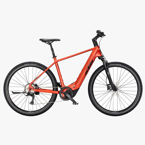 Bicicleta de trekking elétrica KTM Macina Cross CX 610 H, cor laranja queimado mate.