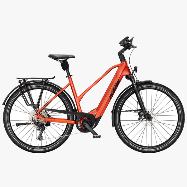Bicicleta elétrica de trekking KTM Macina Style 830 D, laranja queimado mate.