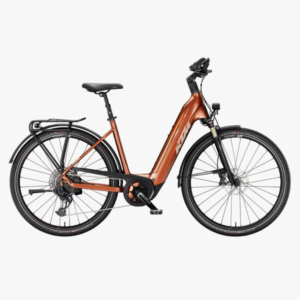 Bicicleta de trekking elétrica KTM Macina Tour CX AXS US Terra